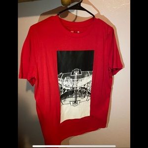 Xersion red, white and black basketball tee.